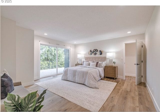 bedroom featuring recessed lighting, baseboards, light wood-style flooring, and access to outside