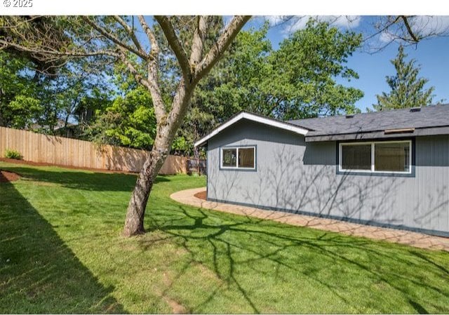 view of yard with fence