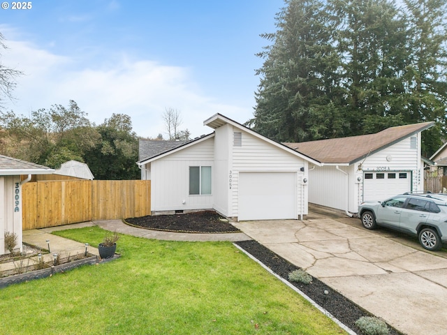 ranch-style house with a front yard and a garage