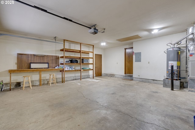 garage with a garage door opener, gas water heater, and electric panel