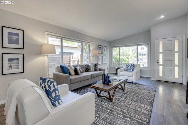 living room with baseboards, vaulted ceiling, recessed lighting, and wood finished floors