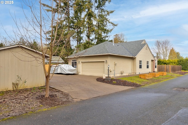 view of property exterior with a garage