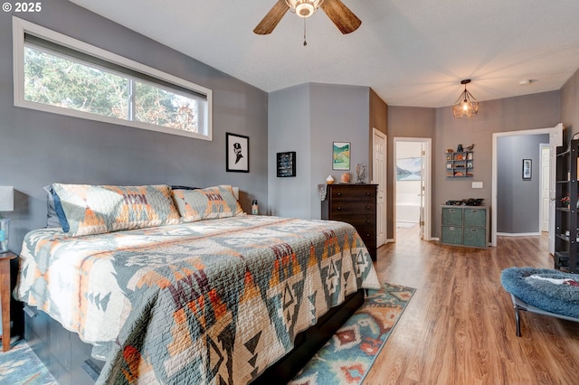 bedroom featuring hardwood / wood-style floors and ceiling fan