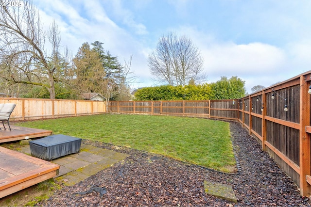 view of yard featuring a deck