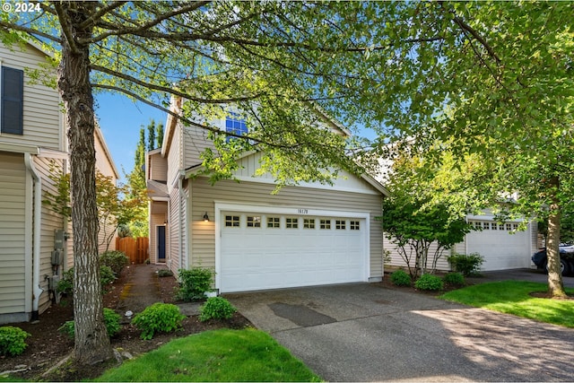 front of property with a garage