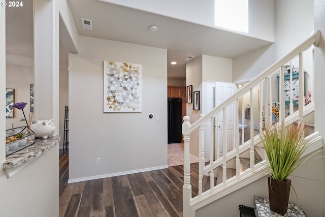 interior space with dark hardwood / wood-style flooring