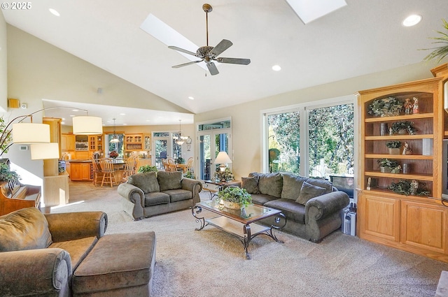 5632 Mac Way, Silverton, OR 97381 - living room featuring a skylight, light colored carpet, a ceiling fan, high vaulted ceiling, and recessed lighting