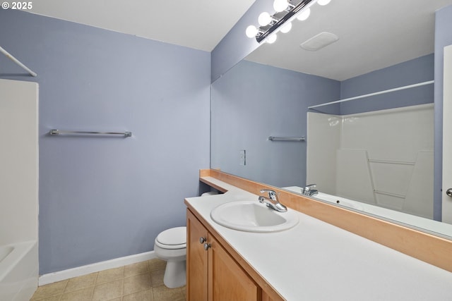 full bathroom with baseboards, toilet, shower / washtub combination, and vanity