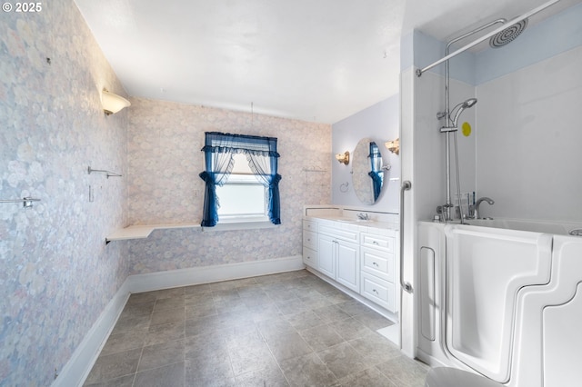 bathroom featuring washer / clothes dryer and vanity