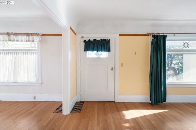 entrance foyer with light hardwood / wood-style flooring