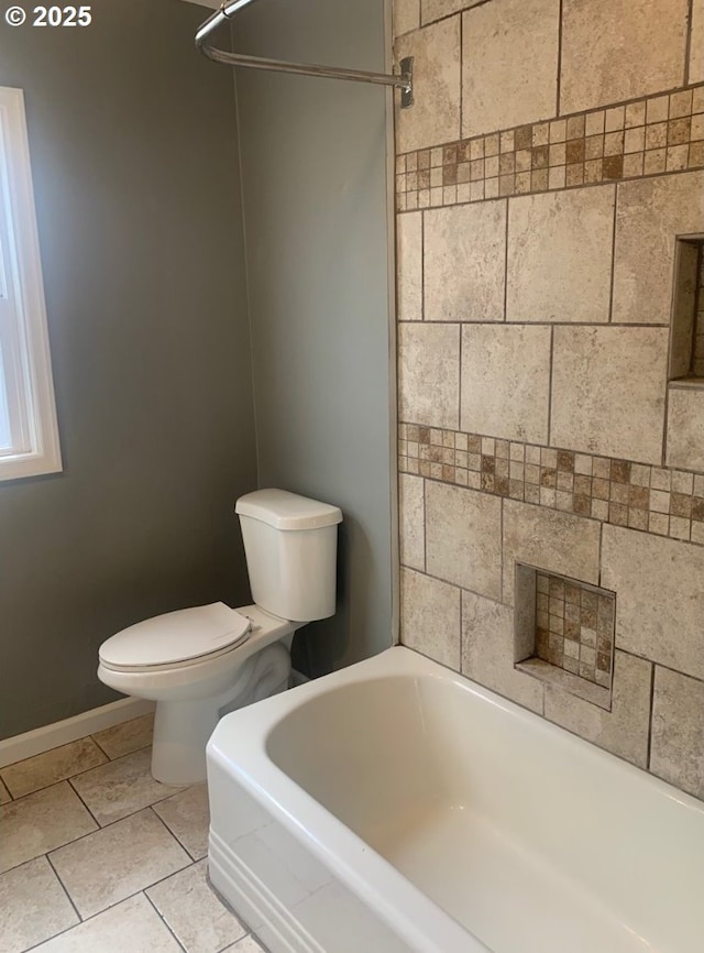 full bathroom with tile patterned flooring, a shower, toilet, baseboards, and a bath