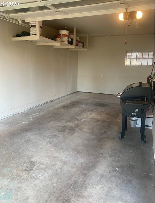 3552 NE Killingsworth St, Portland, OR 97211 - garage featuring a garage door opener