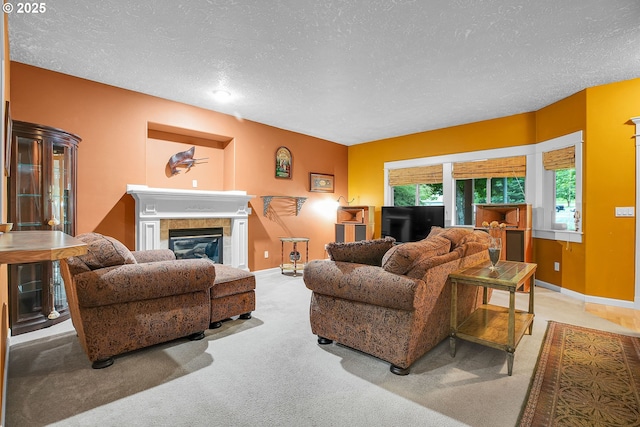 1259 SE Stapleton Loop, Gresham, OR 97080 - carpeted living room with a textured ceiling, baseboards, and a tile fireplace