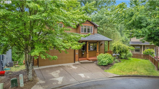 1259 SE Stapleton Loop, Gresham, OR 97080 - chalet / cabin featuring driveway, covered porch, a garage, central AC, and a front lawn