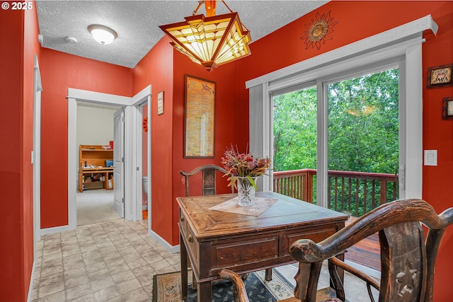 1259 SE Stapleton Loop, Gresham, OR 97080 - dining room with a textured ceiling and baseboards