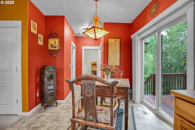 1259 SE Stapleton Loop, Gresham, OR 97080 - dining room with baseboards and a textured ceiling