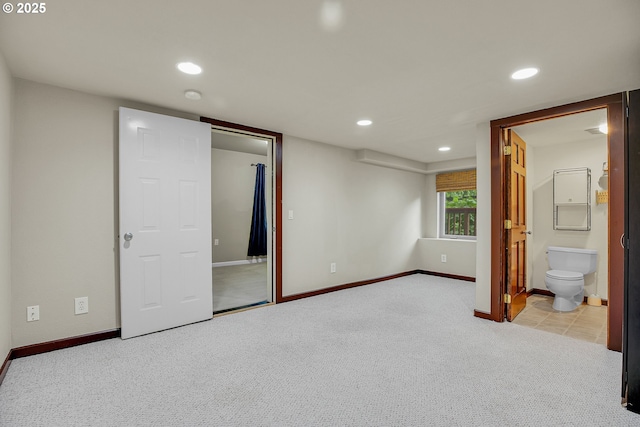 1259 SE Stapleton Loop, Gresham, OR 97080 - unfurnished bedroom featuring carpet, baseboards, recessed lighting, and ensuite bathroom