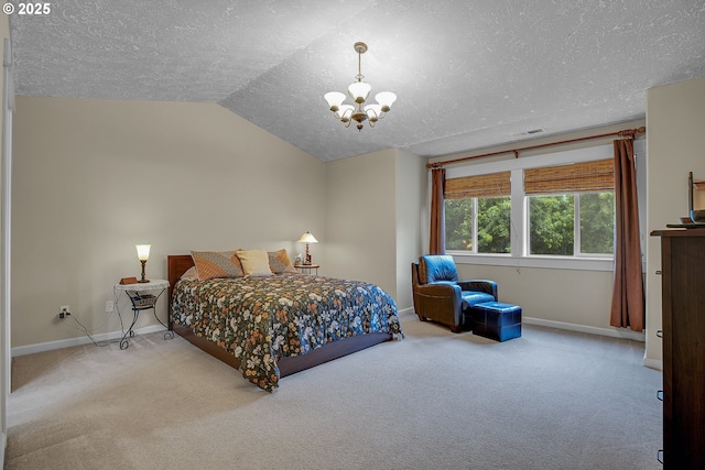 1259 SE Stapleton Loop, Gresham, OR 97080 - bedroom with a textured ceiling, carpet flooring, baseboards, a chandelier, and lofted ceiling
