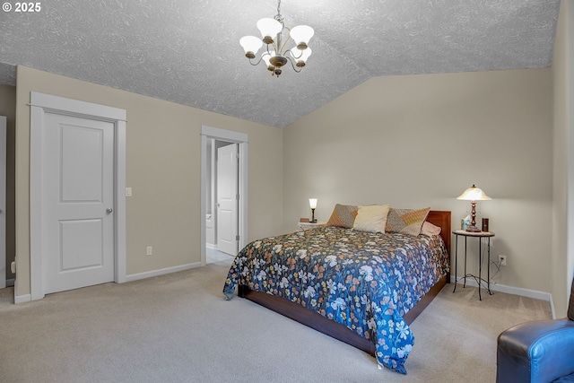 1259 SE Stapleton Loop, Gresham, OR 97080 - carpeted bedroom featuring a chandelier, a textured ceiling, vaulted ceiling, and baseboards