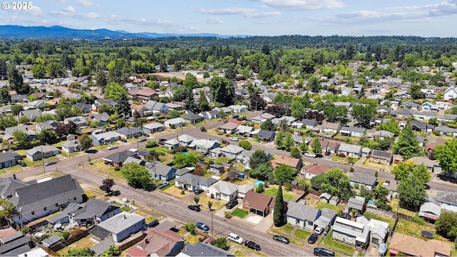 1059 16th Ave SW, Albany, OR 97321 - aerial view of residential area featuring mountains and a heavily wooded area