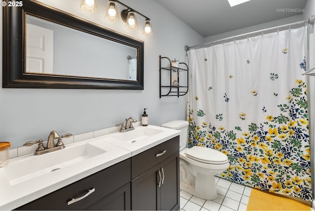 7100 SW 164th Ter, Beaverton, OR 97007 - bathroom featuring toilet, double vanity, tile patterned flooring, and a shower with shower curtain