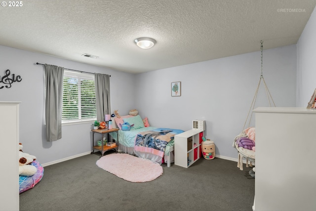 7100 SW 164th Ter, Beaverton, OR 97007 - bedroom with carpet, a textured ceiling, and baseboards