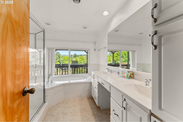 154 W Hickory St, Roseburg, OR 97471 - full bath featuring a bath, double vanity, a stall shower, recessed lighting, and tile patterned flooring