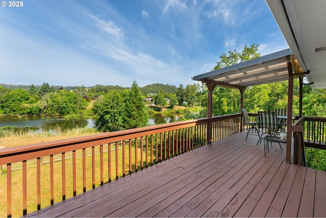154 W Hickory St, Roseburg, OR 97471 - wooden terrace with a water view, a yard, and outdoor dining area
