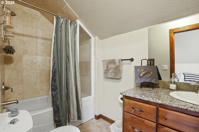 full bathroom featuring shower / bath combination with curtain, vanity, tile patterned flooring, toilet, and a textured ceiling