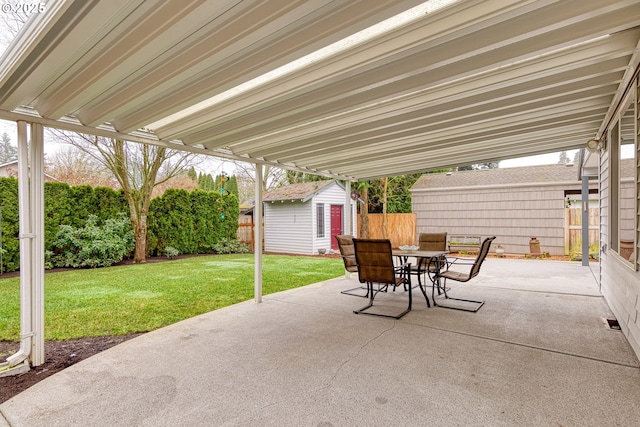 view of patio / terrace featuring a shed