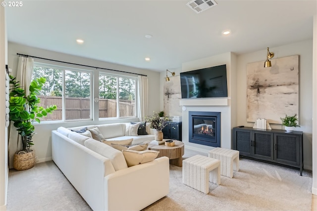 5990 Henshaw St SE, Albany, OR 97322 - carpeted living room with a glass covered fireplace and recessed lighting