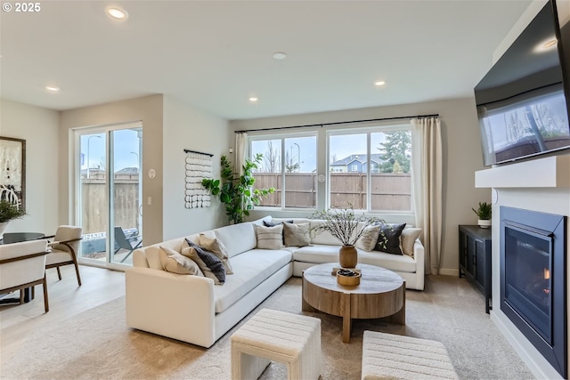 5990 Henshaw St SE, Albany, OR 97322 - living room with healthy amount of natural light, recessed lighting, and a glass covered fireplace