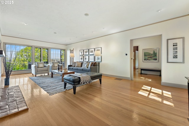 2687 NW Cornell Rd, Portland, OR 97210 - living area featuring light wood-type flooring and crown molding