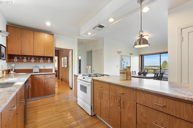 2687 NW Cornell Rd, Portland, OR 97210 - kitchen featuring white gas stove, light wood finished floors, light stone countertops, recessed lighting, and decorative light fixtures