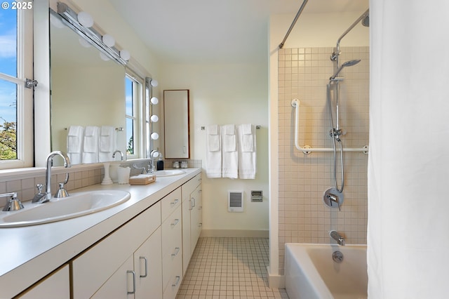 2687 NW Cornell Rd, Portland, OR 97210 - full bath featuring double vanity, plenty of natural light, tile patterned flooring, and shower / tub combination