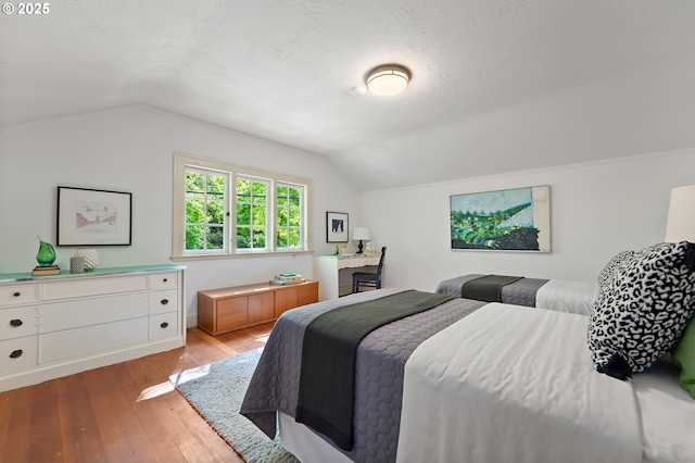 2687 NW Cornell Rd, Portland, OR 97210 - bedroom with vaulted ceiling and light wood-type flooring