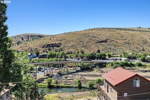 view of mountain feature featuring a water view
