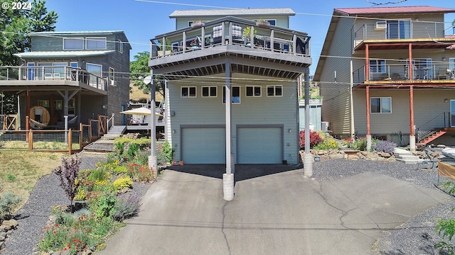 view of front of property with an attached garage and aphalt driveway