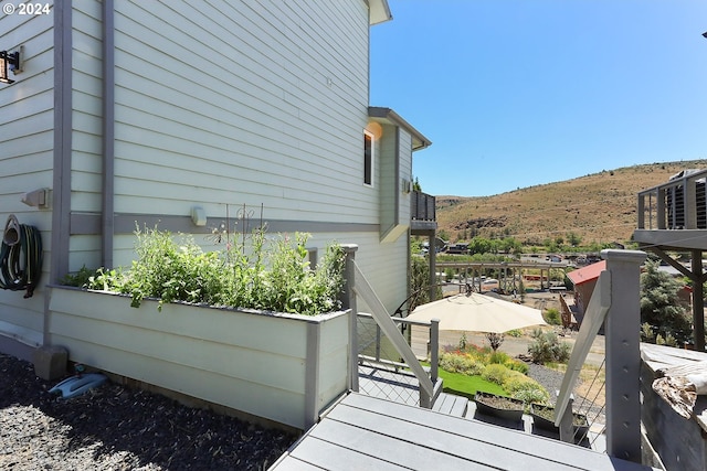 view of home's exterior with a mountain view