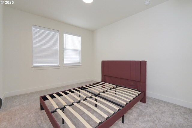 2389 SE 135th Ave Unit 11, Portland, OR 97233 - unfurnished bedroom featuring carpet and baseboards