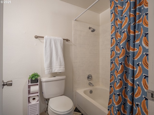 bathroom with shower / bath combination with curtain and toilet