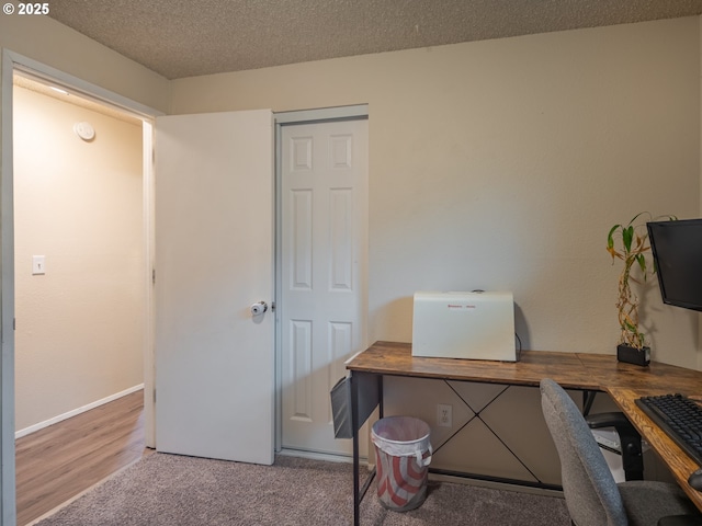 home office with a textured ceiling