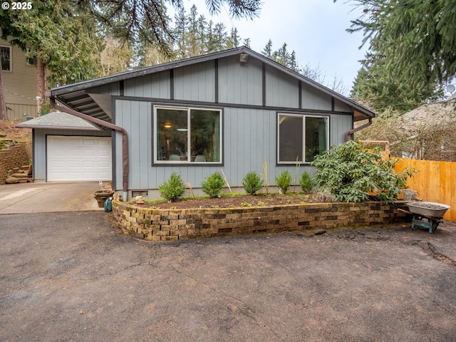 view of front of home with a garage