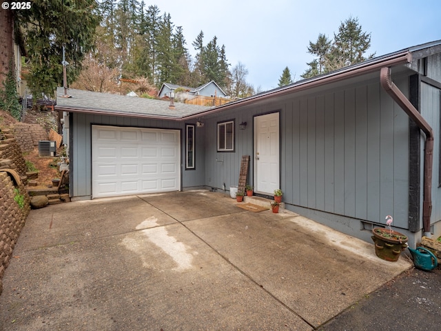 single story home with a garage