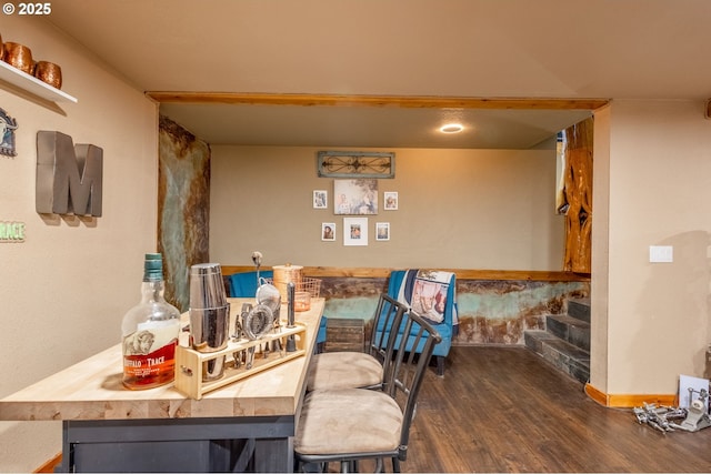 dining area with dark hardwood / wood-style floors