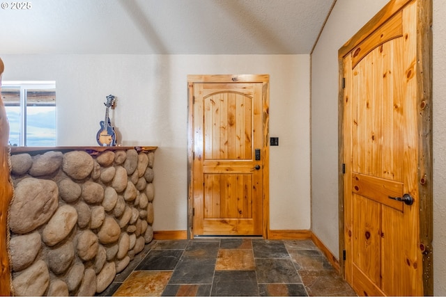 entrance foyer with a textured ceiling