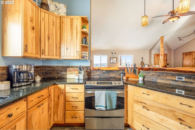 kitchen featuring electric stove, pendant lighting, ceiling fan, vaulted ceiling, and dark stone counters