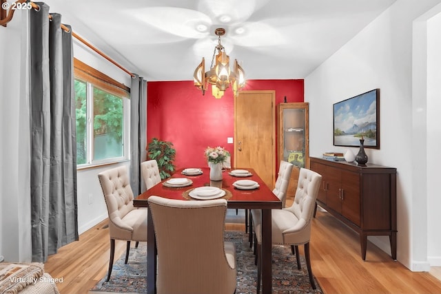 61241 Perry Creek Rd, Saint Helens, OR 97051 - dining space featuring baseboards, light wood-type flooring, and a chandelier