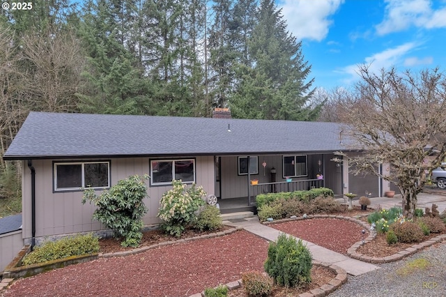 61241 Perry Creek Rd, Saint Helens, OR 97051 - ranch-style house with roof with shingles, a porch, and a chimney