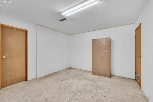 61241 Perry Creek Rd, Saint Helens, OR 97051 - unfurnished room featuring visible vents and a textured ceiling